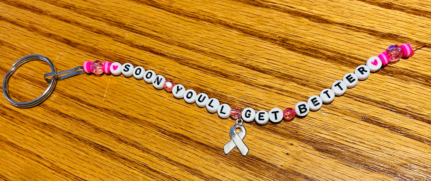 TS ‘Soon You’ll Get Better’ Awareness Keychains